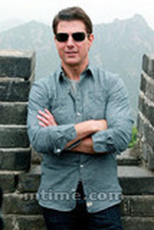 阿汤哥兴致勃勃地来到慕田峪长城观光游览。