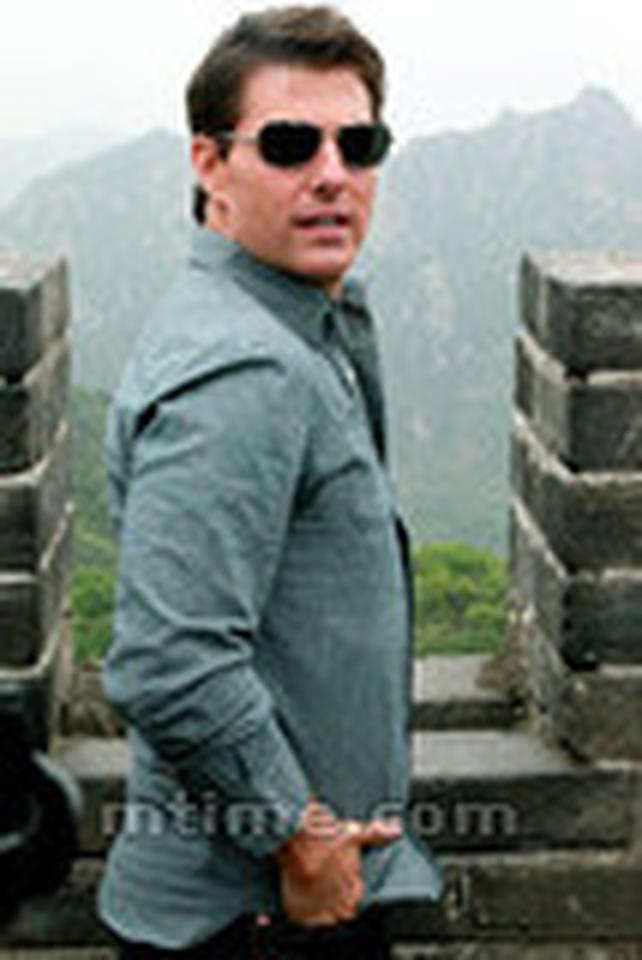 阿汤哥兴致勃勃地来到慕田峪长城观光游览。
