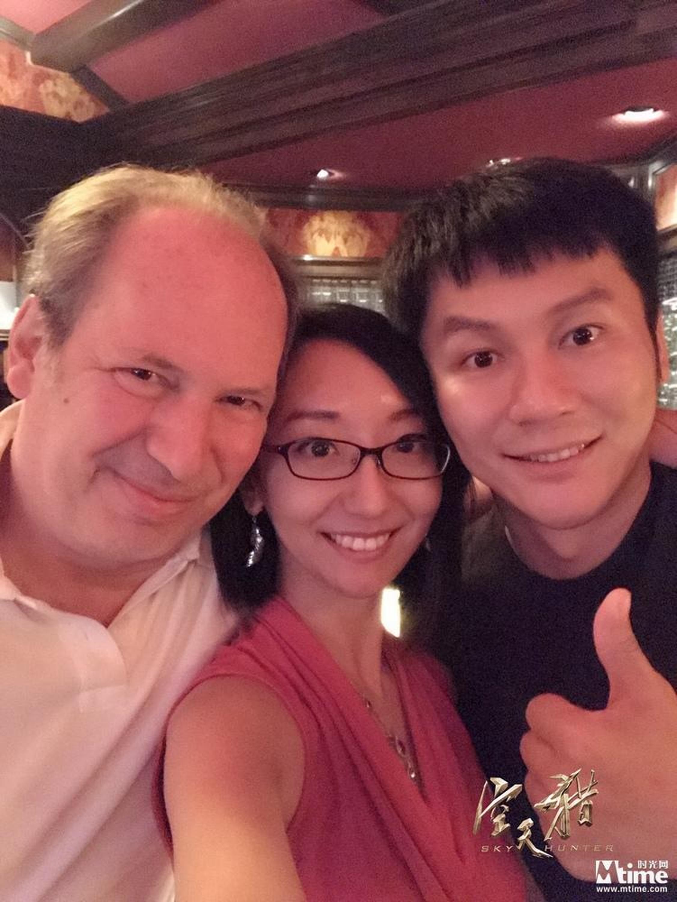 汉斯季默、音乐制作人于飞、李晨合影